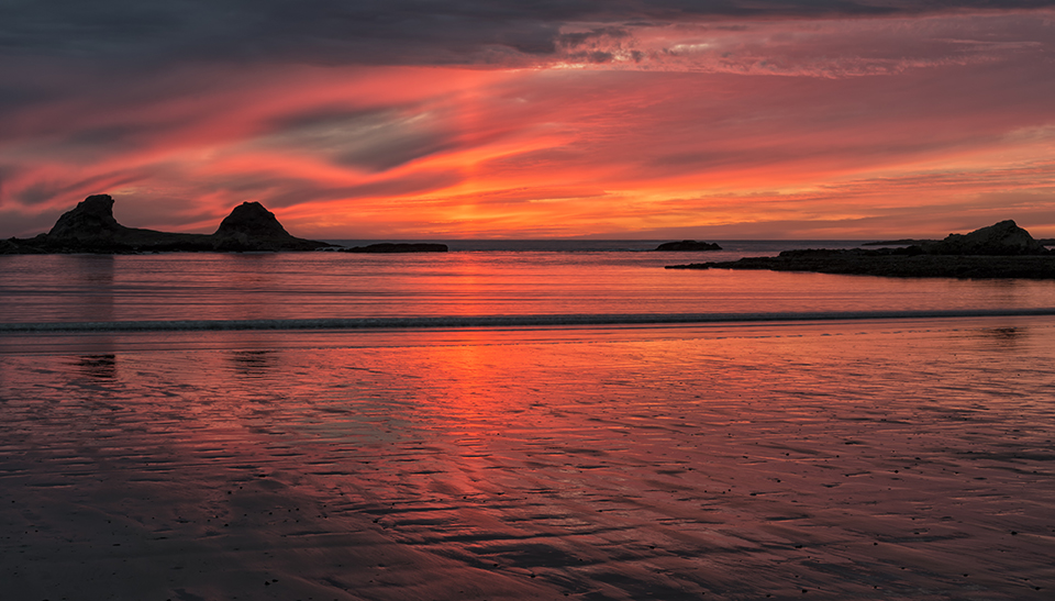 "Mystical Sunset" by Loree Johnson Photography. As I waited for the sun to set from the beach at Sunset Bay Oregon, I noticed some unusual clouds forming beyond the rocks. Then, as the sun went down and the colors began to intensify, the strange clouds took on the appearance of brush strokes in the sky. It is days like these that remind me how truly wonderful it is to be alive.